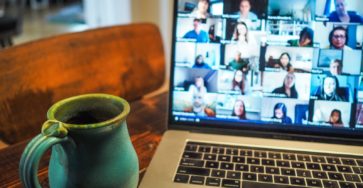 macbook pro displaying group of people